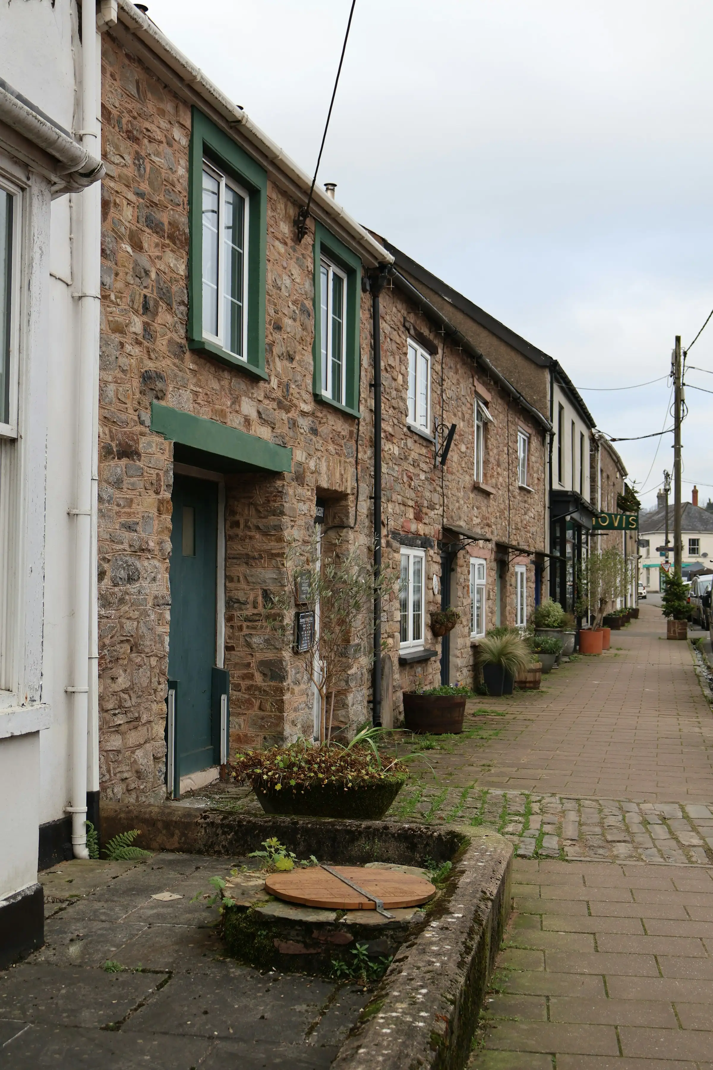 Stone cottages along a narrow English street