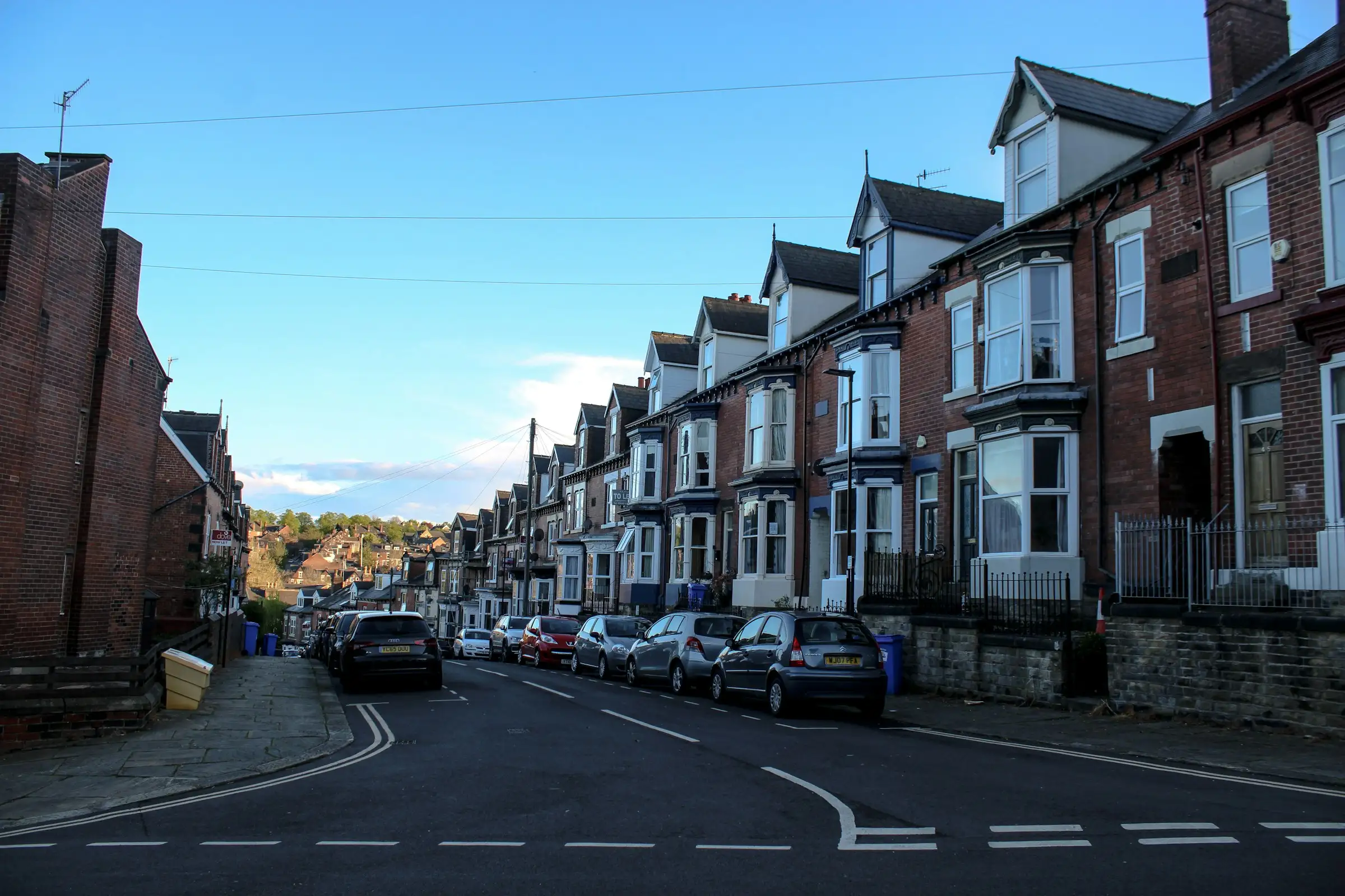 A residential street of English terraced houses